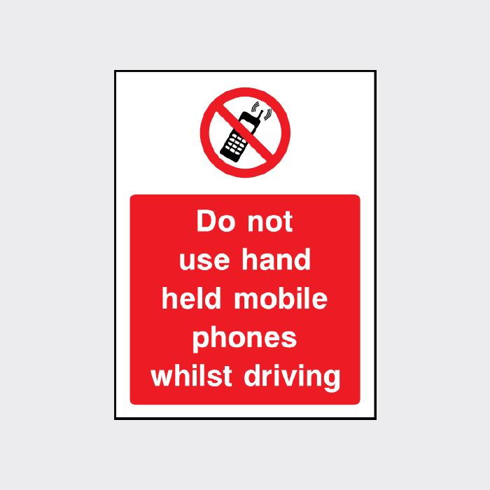 Do not use hand held mobile phones whilst driving sign