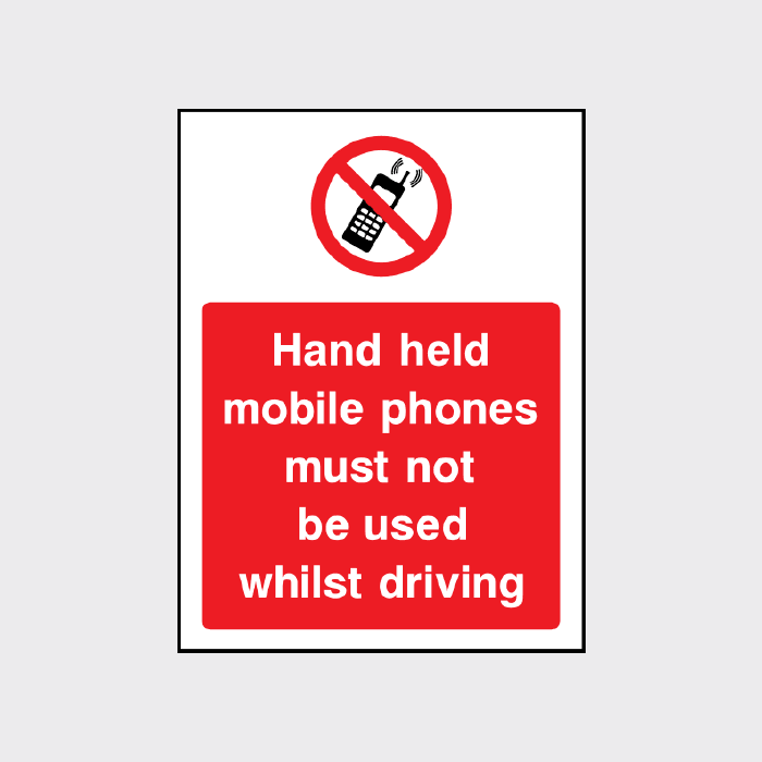 Hand held mobile phones must not be used whilst driving sign