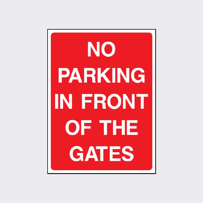 No parking in front of these gates sign