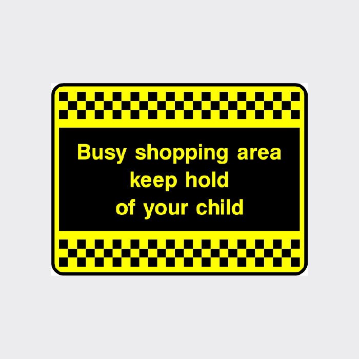 Busy shopping area keep hold of your child sign