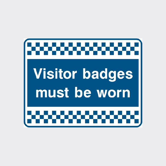 Visitor badges must be worn sign