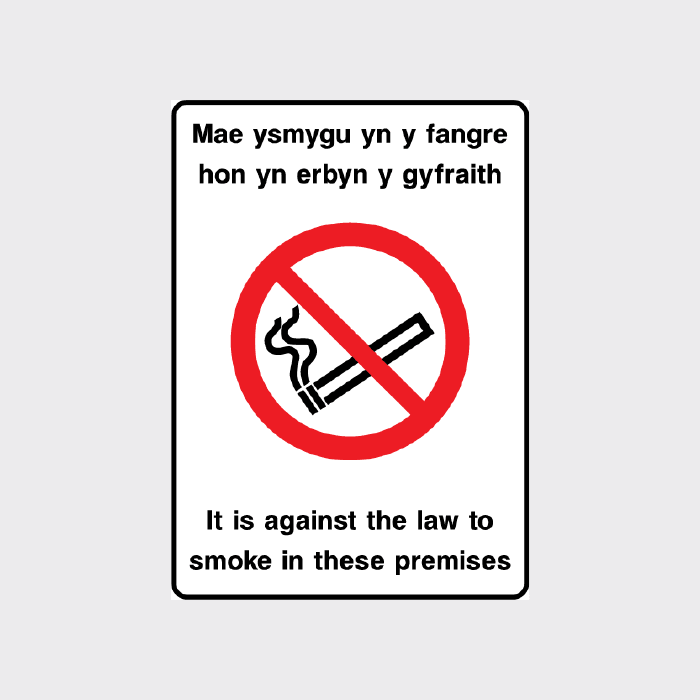 It is against the law to smoke in these premises in welsh sign