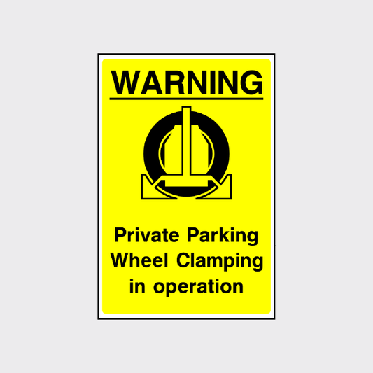 Warning - Private parking wheel clamping in operation sign