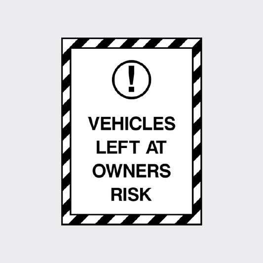 Vehicles left at owners risk sign