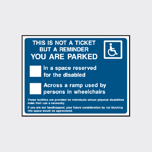 This is a reminder you are parked in a disabled parking space sign